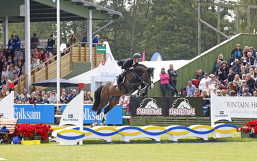Marcus Ehning with Plot Blue