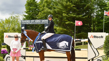 Hunter Holloway and Kalina N welcome a win in Traverse City