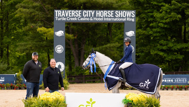 Sweet surprise for Kaitlin Campbell and Questa vd Heffinck during Traverse City Spring Series