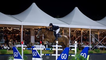 Callie Schott and Garant go all out to win $340,000 Go Rentals CSI5* 1.60m Grand Prix at  Desert International Horse Park