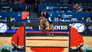 Roger Yves Bost and Ballerine du Vilpion win the Longines Grand Prix in Hong Kong