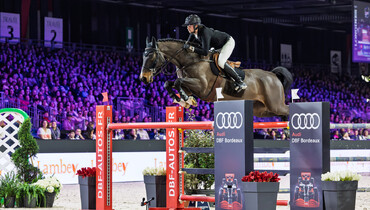 Martin Fuchs and Conner Jei race to win the CSI5*-W 1.60m Audi Grand Prix in Bordeaux