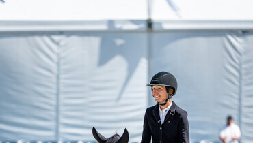 A home win for Charlotte Jacobs and Rincoola Milsean in the second qualifier for the Rolex US Equestrian Open Grand Prix at the Winter Equestrian Festival - Rolex Finale Week
