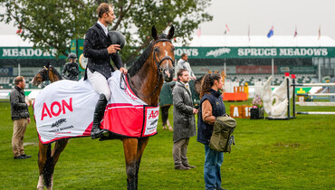 Richard Vogel and Gangster Montdesir rise above the rain to win the AON Grand Prix, presented by Rolex
