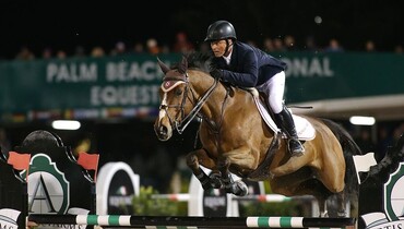 Todd Minikus and Quality Girl race to win in Marshall & Sterling Grand Prix at Winter Equestrian Festival