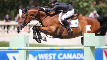Lucy Deslauriers takes the biggest win of the day at Spruce Meadows