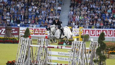 Marcus Ehning and Calanda stay 0.04 seconds ahead of Bertram Allen in Sparkassen Youngster Cup Final