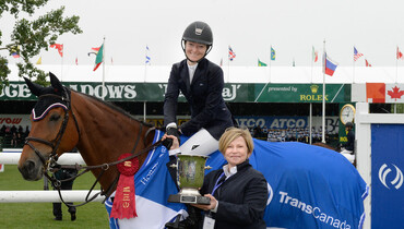 Lucy Deslauriers takes the cake in TransCanada Winning round at Spruce Meadows