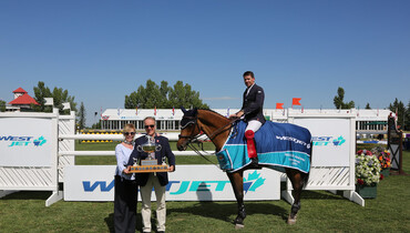 Conor Swail takes flight in the WestJet Cup at Spruce Meadows