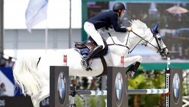 Pieter Devos drives home in a BMW 1 serie after winning the CSI3* Grand Prix at Knokke Hippique