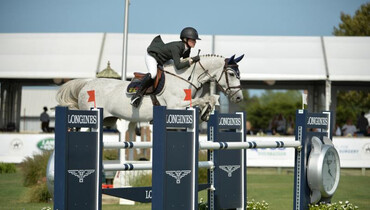 Amanda Derbyshire streaks to victory in the $30,000 Boar's Head Open Jumper Challenge presented by Dan's Papers