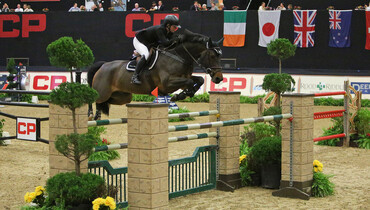 Emily Moffitt makes winning debut at CP National Horse Show in CP Grand Prix International Open Jumpers