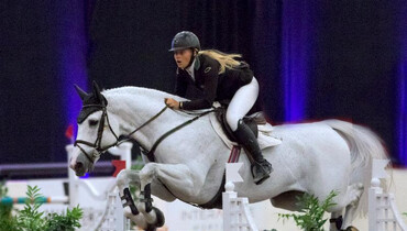 Vanderveen verifies a victory in the $50,000 FEI 1.50m Las Vegas National Welcome Speed Classic