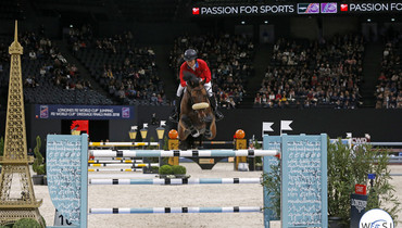 Beezie Madden with a rail in hand on the Longines FEI World Cup Final's overall standings