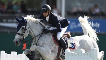 Eduardo Menezes wins by 0.14s at Spruce Meadows