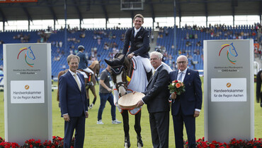 Darragh Kenny opens Wednesday with a win in Aachen