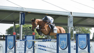 Molly Ashe-Cawley and Cassandra beat the heat in the Palm Beach Masters Open Jumper class at the Hampton Classic