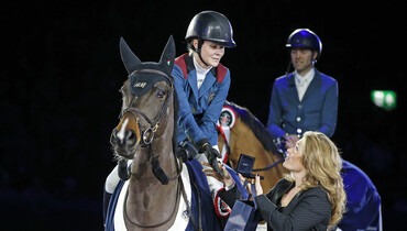 Awards for Malin Baryard-Johnsson, Simon Delestre and Henrik von Eckermann at Jumping Amsterdam
