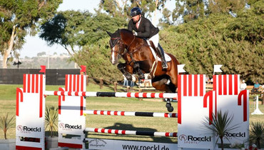 Guy Thomas leads the victory gallops in the FEI CSI2* Silver Tour highlight event