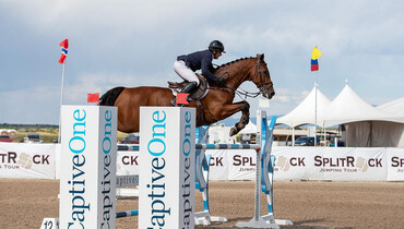 Mathis Schwentker wins the CaptiveOne Welcome Stake at the Split Rock Jumping Tour's Santa Fe International