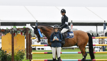 Adrienne Sternlicht takes the $10,000 Wölffer Estate Open Jumper class at the Hampton Classic