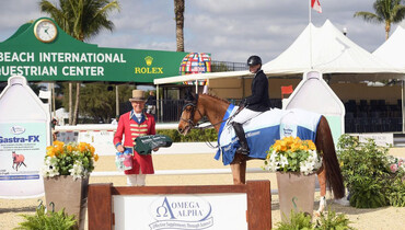 Holiday & Horses wraps up with a win by Erynn Ballard and Canora Z in the Omega Alpha National Grand Prix