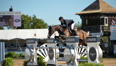 McLain Ward takes home the blue in the Hampton Classic’s $37,000 1.50m FEI Jumper Classic