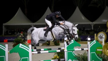 Jordan Coyle and Ariso jump to victory in the $230,000 Adequan® Major League Show Jumping Grand Prix CSI5*, presented by Essence Art Gallery