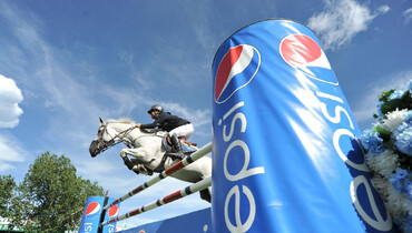 Nicolas Pizarro with his first win in the International Ring at Spruce Meadows
