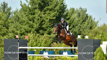 Grace Debney delivers in Premier Equestrian CSI5* winning round