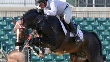 Todd Minikus and Con Capilot capture Kentucky Spring Horse show 1.45m open jumper victory
