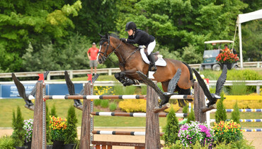When it rains it pours: Katie Dinan scores second consecutive $145,100 CSI3* Grand Prix win