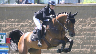 Erynn Ballard best in the CSI5* 1.50-1.55m The Mustangs at Spruce Meadows