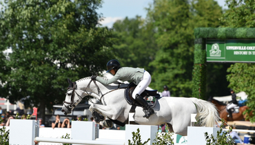 Mimi Gochman and Cosmos BH lead the way in the $226,000 FEI 4* Upperville Jumper Classic co-presented by Ethel M Chocolates and Lugano Diamonds at the Upperville Colt & Horse Show presented by MARS Equestrian™