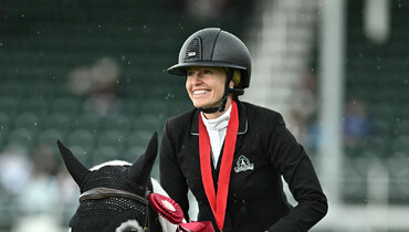 Canada's Tiffany Foster and Battlecry finish first in RBC Grand Prix, presented by Rolex, at Spruce Meadows