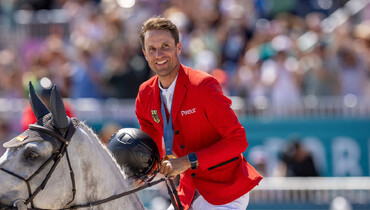 Christian Kukuk and Checker 47 crowned Olympic champions in Versailles
