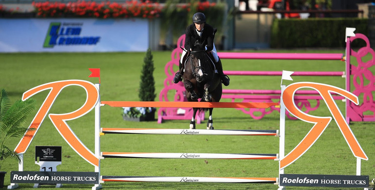 Robert Murphy and Hulde G take the top spot in Saturday's CSI4* 1.50m at Longines Tops International Arena
