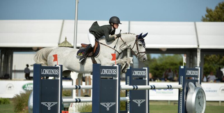 Amanda Derbyshire streaks to victory in the $30,000 Boar's Head Open Jumper Challenge presented by Dan's Papers