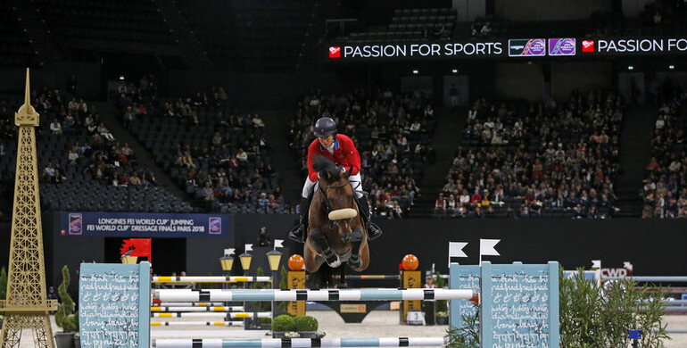 Beezie Madden with a rail in hand on the Longines FEI World Cup Final's overall standings
