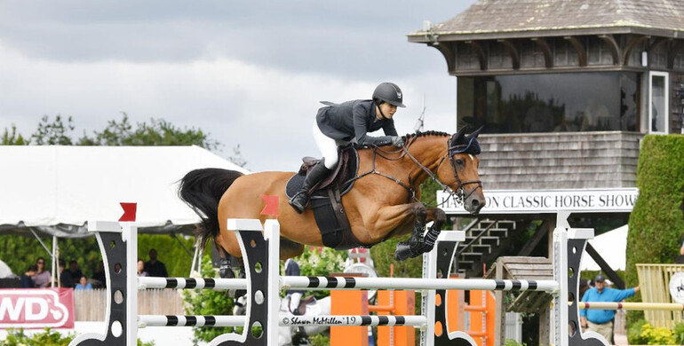 Adrienne Sternlicht wins by milliseconds in the $30,000 Land Rover Jumper Challenge presented by Jaguar, at the 44th Hampton Classic
