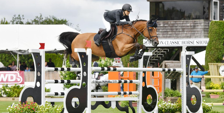 Adrienne Sternlicht wins by milliseconds in the $30,000 Land Rover Jumper Challenge presented by Jaguar, at the 44th Hampton Classic