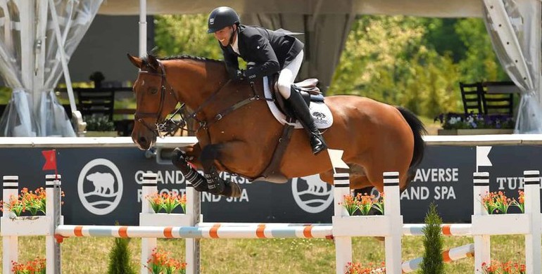 Jonathan Corrigan rides Loughnavatta Indigo to win in $36,600 Welcome Stake at Traverse City Spring Horse Show