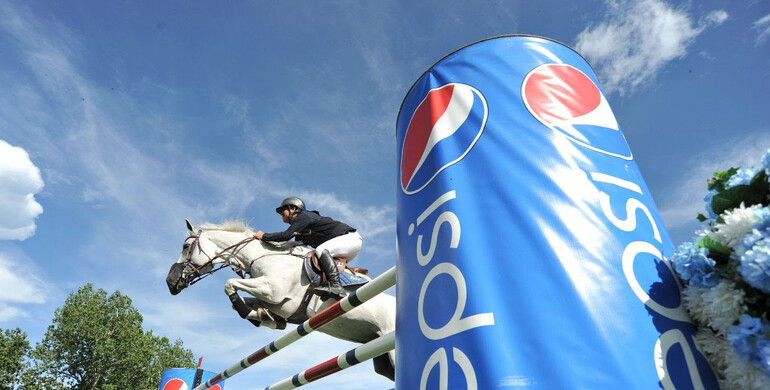 Nicolas Pizarro with his first win in the International Ring at Spruce Meadows