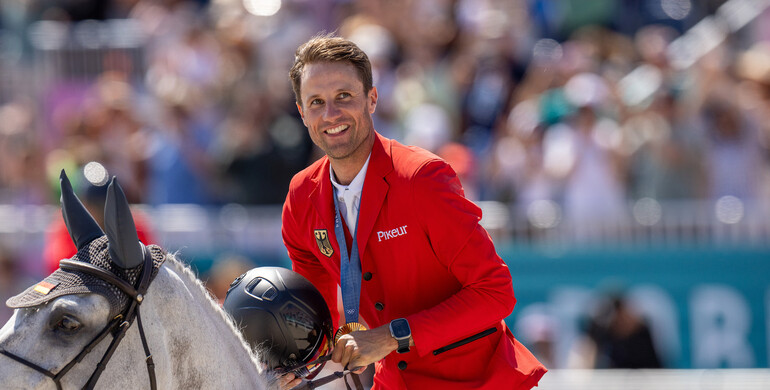 Christian Kukuk and Checker 47 crowned Olympic champions in Versailles