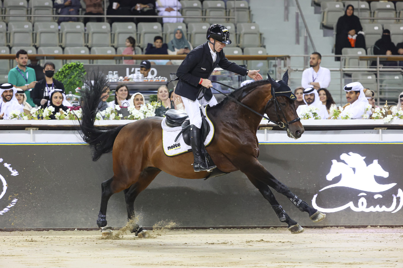 Marcus Ehning and Stargold write history in the CSI5* Commercial Bank ...